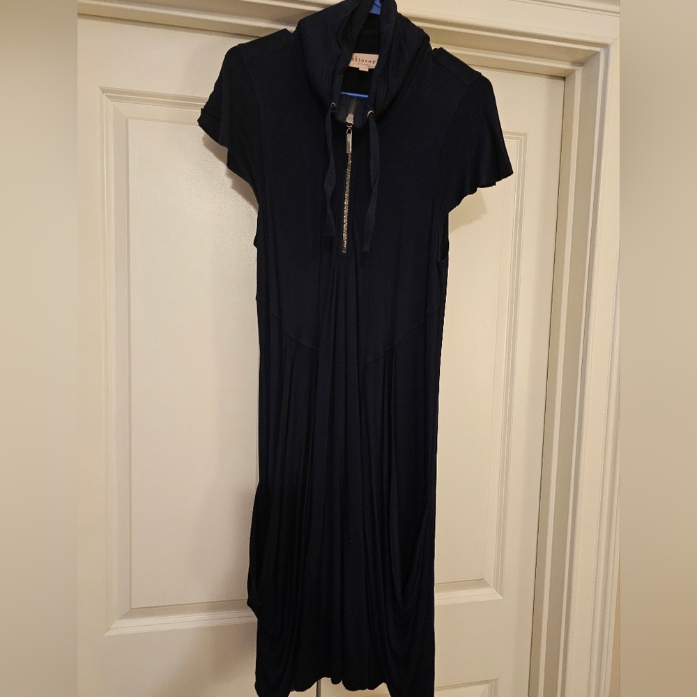 Stylish navy 95% Viscose 5% Spandex dress size large. Trendy yet classy!